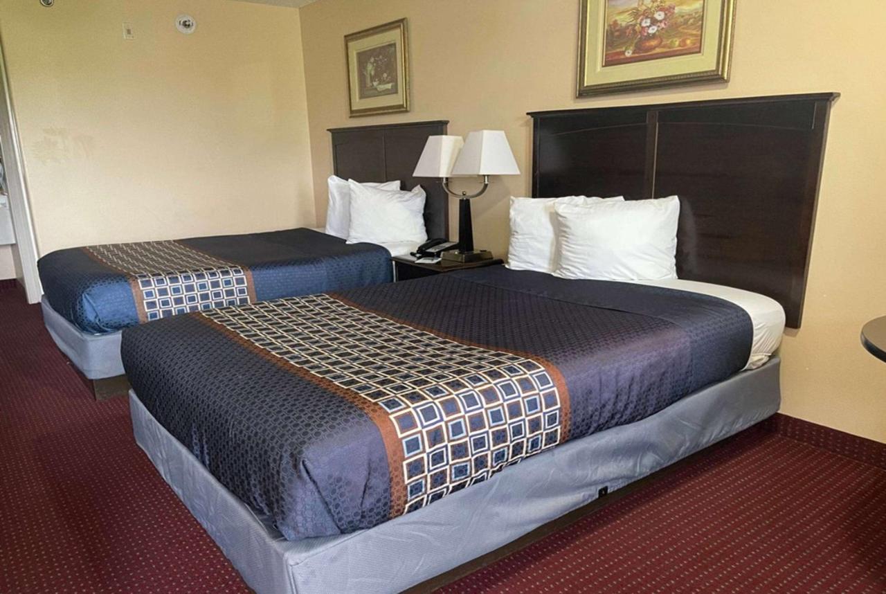 Carom Inn A Travelodge By Wyndham Denham Springs-Baton Rouge Bagian luar foto