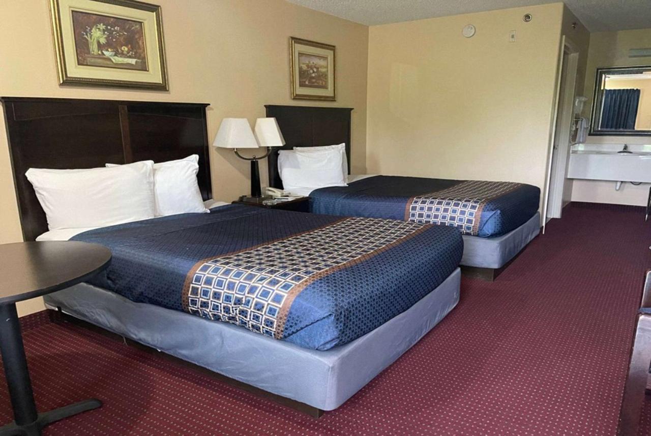 Carom Inn A Travelodge By Wyndham Denham Springs-Baton Rouge Bagian luar foto