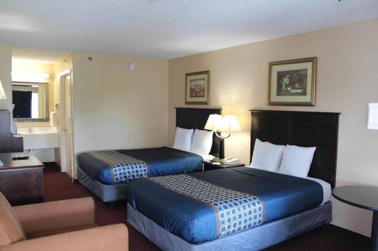 Carom Inn A Travelodge By Wyndham Denham Springs-Baton Rouge Bagian luar foto