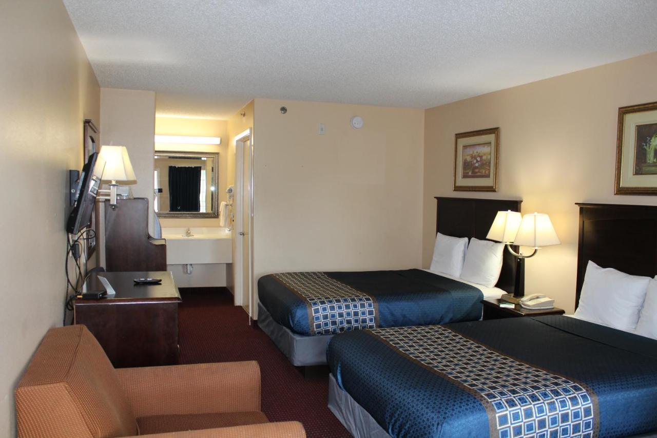 Carom Inn A Travelodge By Wyndham Denham Springs-Baton Rouge Bagian luar foto