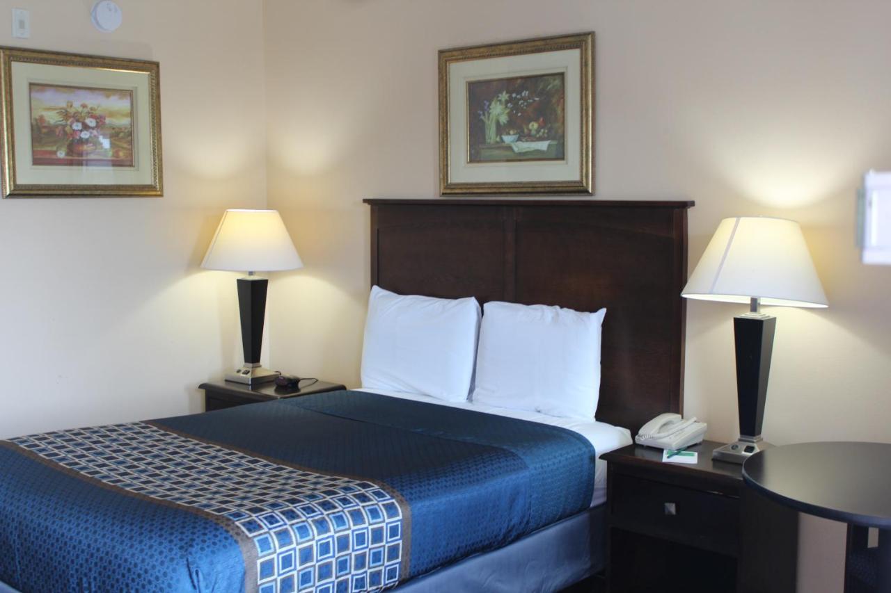 Carom Inn A Travelodge By Wyndham Denham Springs-Baton Rouge Bagian luar foto